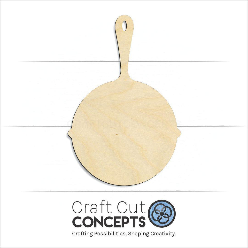 Craft Cut Concepts Logo under a wood Cast Iron Pan craft shape and blank